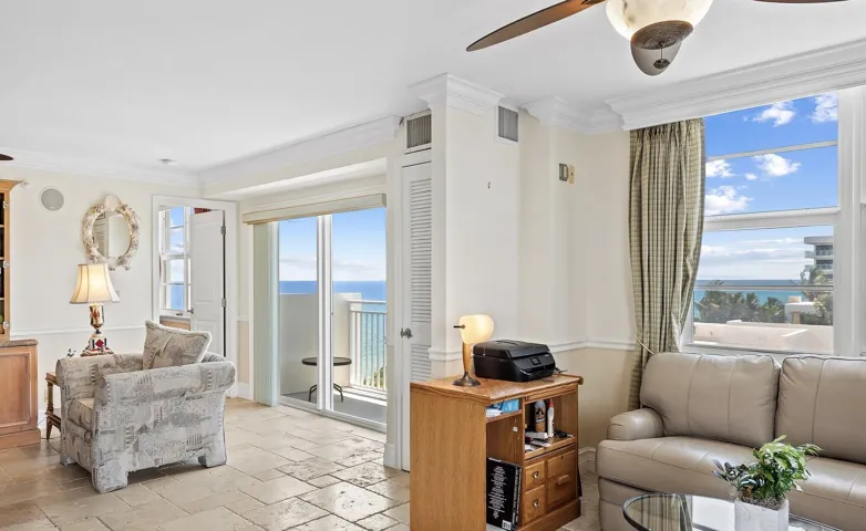 Living room with balcony views