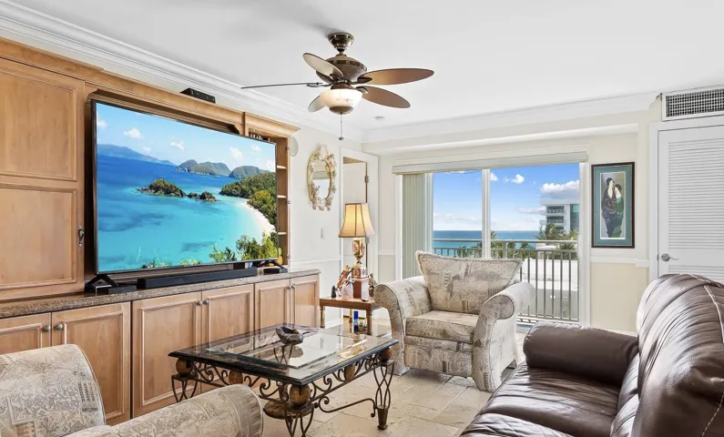 Living room with balcony views
