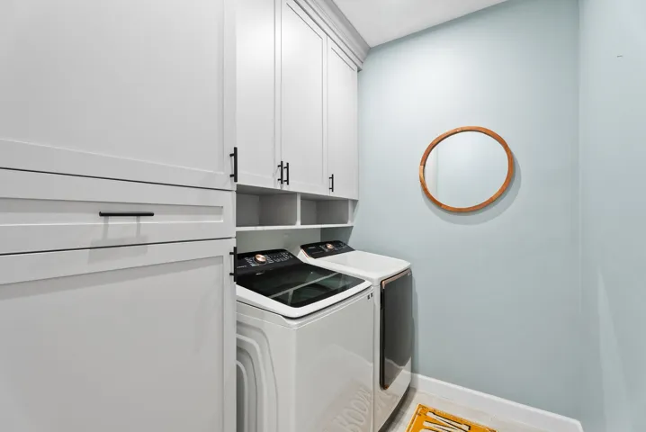 Laundry room with cabinets