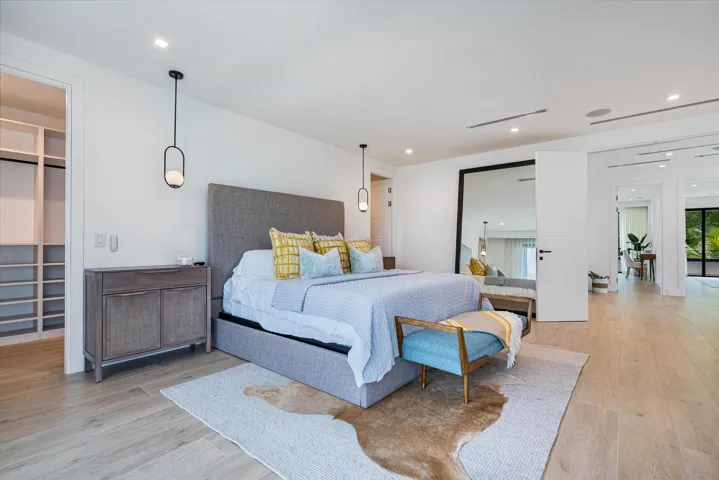 Luxurious primary suite with refined comfort and serene atmosphere.