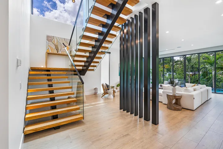 Stunning architectural staircase serving as a striking centerpiece.