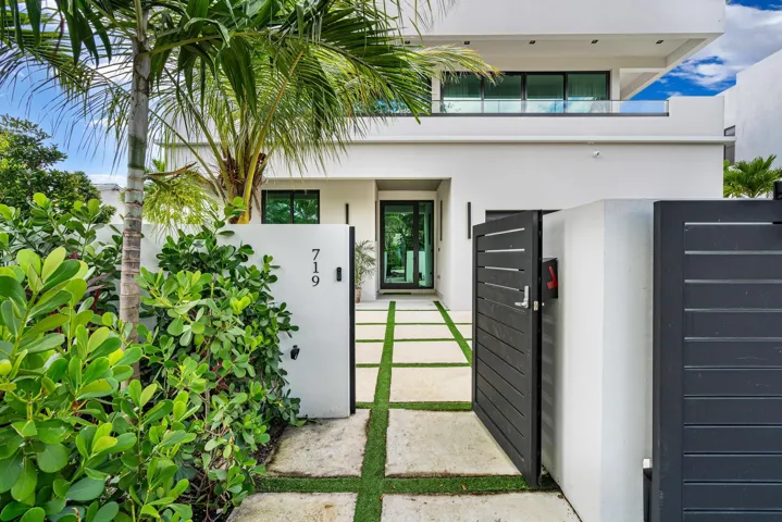 Private pedestrian gate offering secure and discreet access.