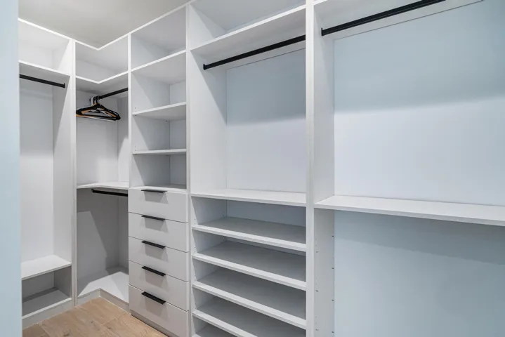 Custom closets throughout the home offering tailored storage and refined organization.