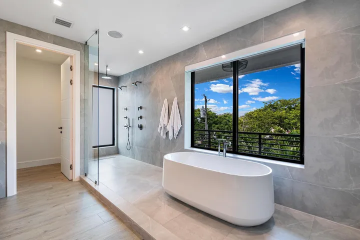 Stunning primary bathroom with spa-like luxury and elegant design.