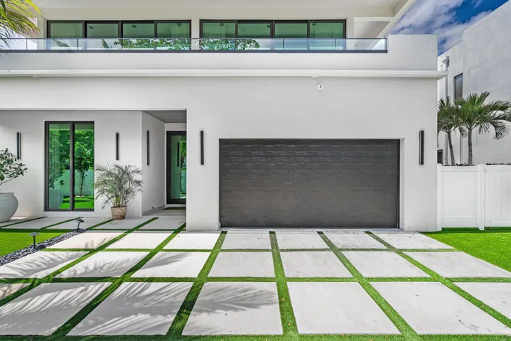 Striking front elevation showcasing refined curb appeal and elegant architecture.