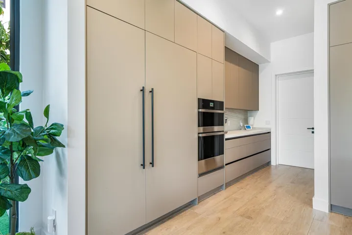 Custom cabinetry with premium craftsmanship, ample storage, and elegant finishes.