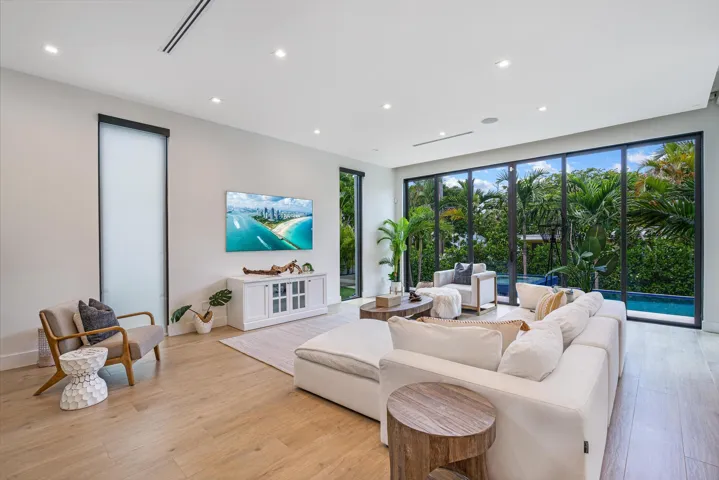 Elegant indoor-outdoor living enhanced by expansive stackable glass doors.