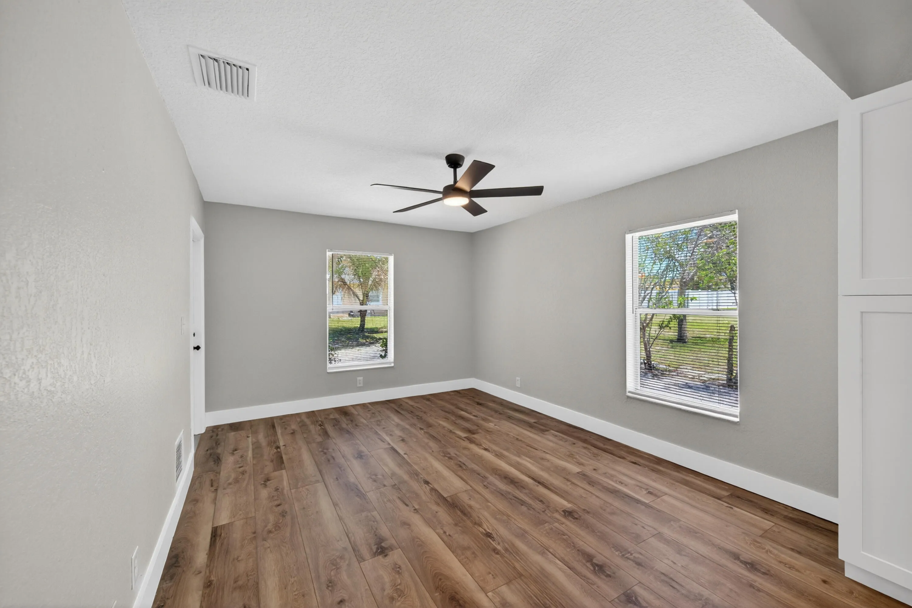 Additional living space with bright natural light and flexible layout potential
