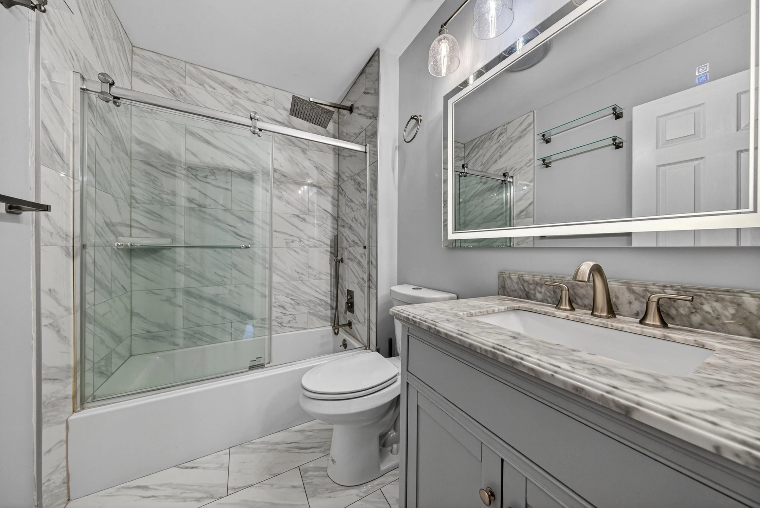 2nd en suite bathroom - lighted mirrors, rainfall shower head with handheld sprayer