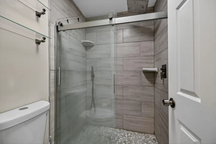 Tiled Standing shower with rain shower head
