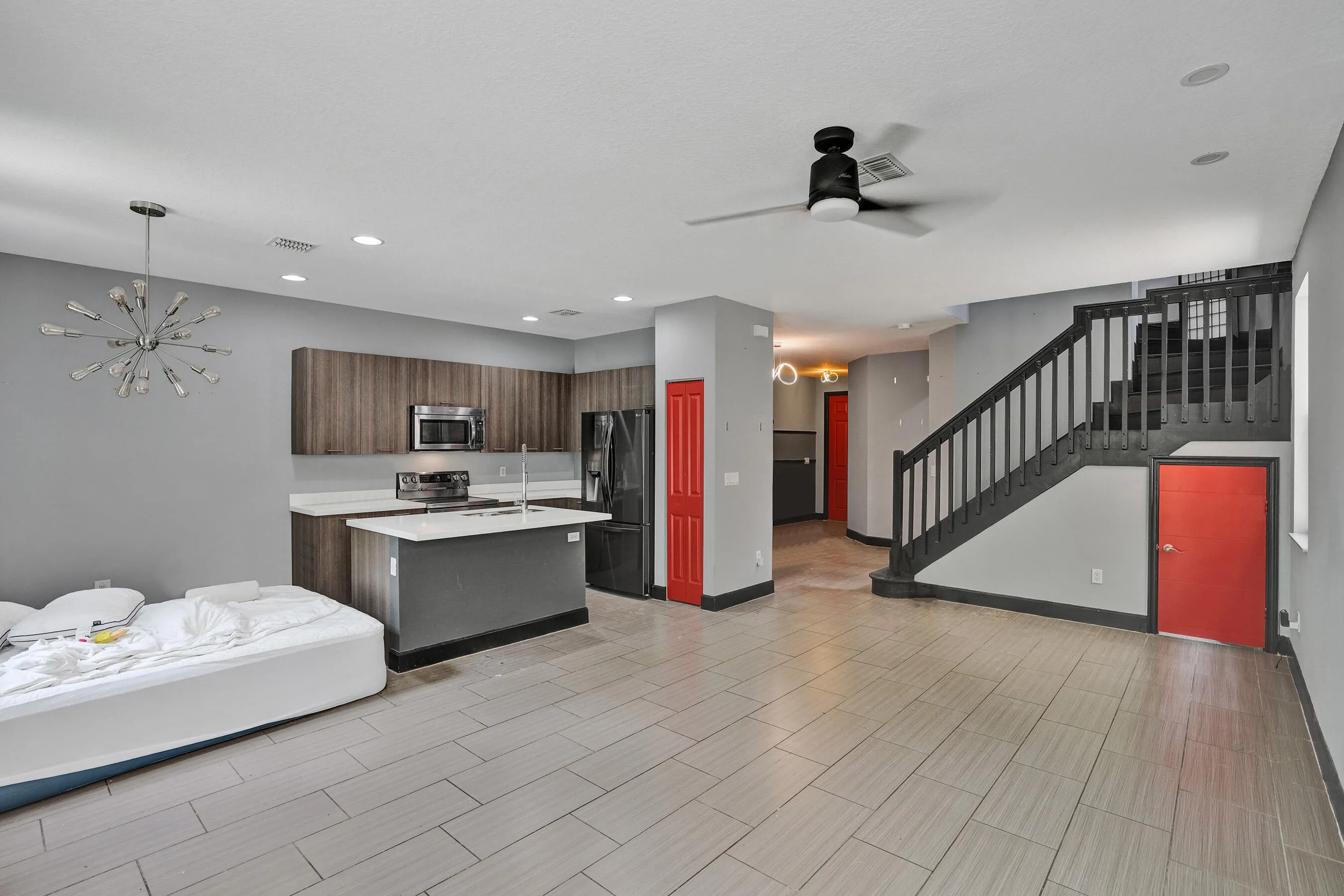 Kitchen / Dining Nook / Family Room / Flex Space with tile flooring that looks like wood.