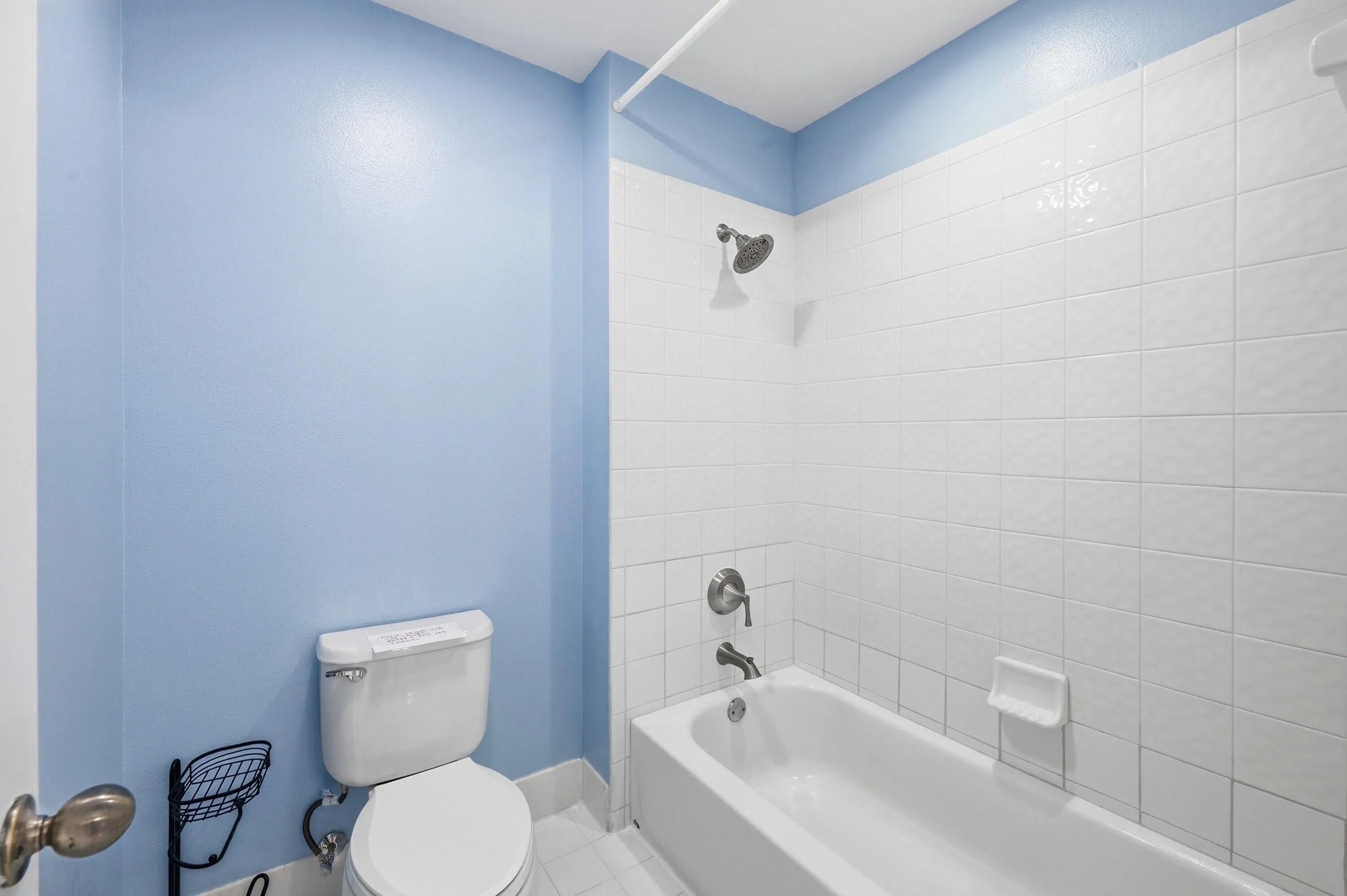 Upstairs bathroom with combo tub and shower