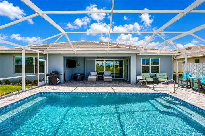 Enjoy the ultimate Florida lifestyle with this private screened lanai and sparkling resort-style pool overlooking peaceful preserve views. Expansive outdoor living area features elegant paver decking, covered seating and dining space, and plenty of room for entertaining or relaxing year-round. Perfectly designed for indoor-outdoor living in Del Webb at Tradition.