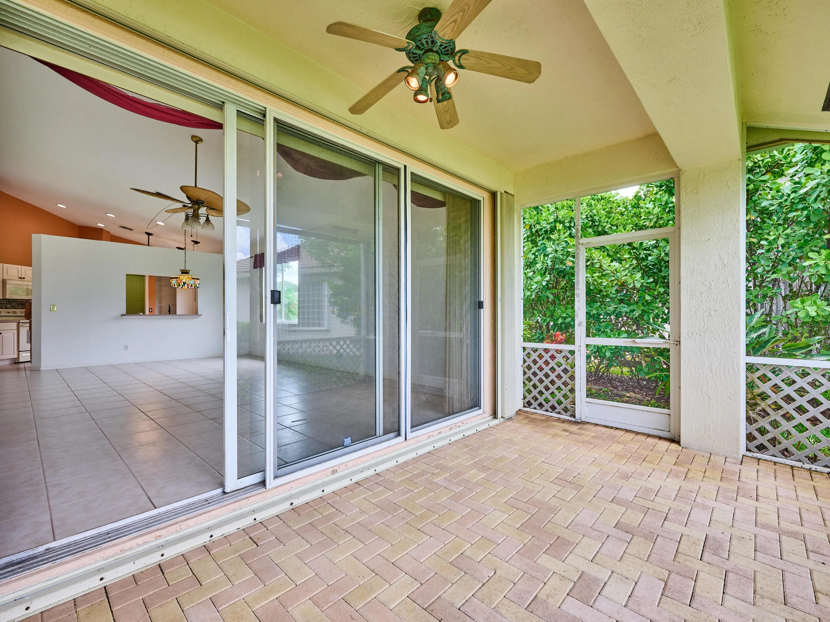 Sliders from great room to paved patio