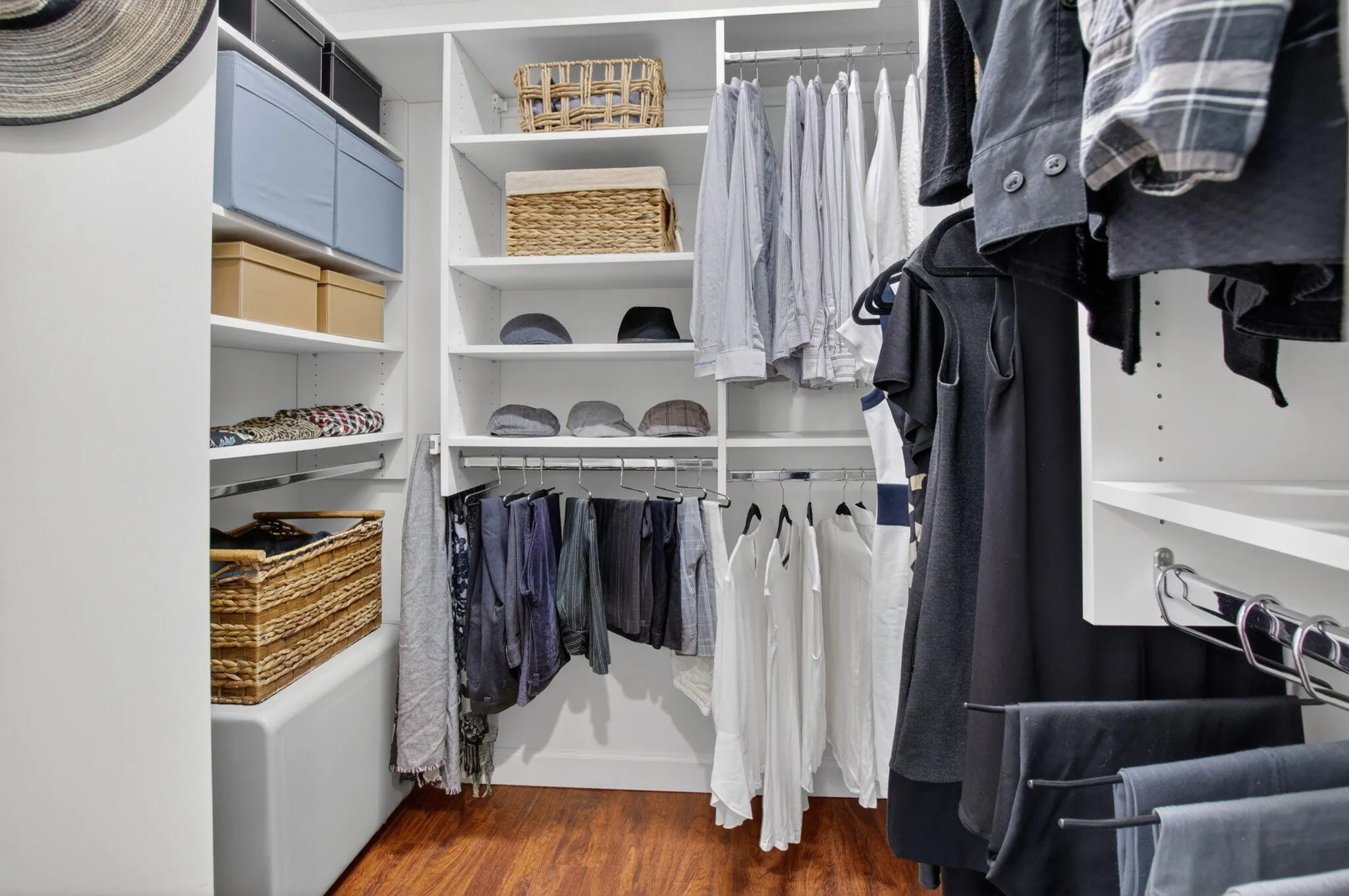Primary bedroom walk-in closet