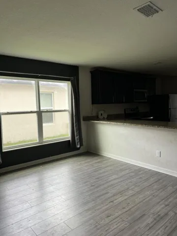 Living area to kitchen