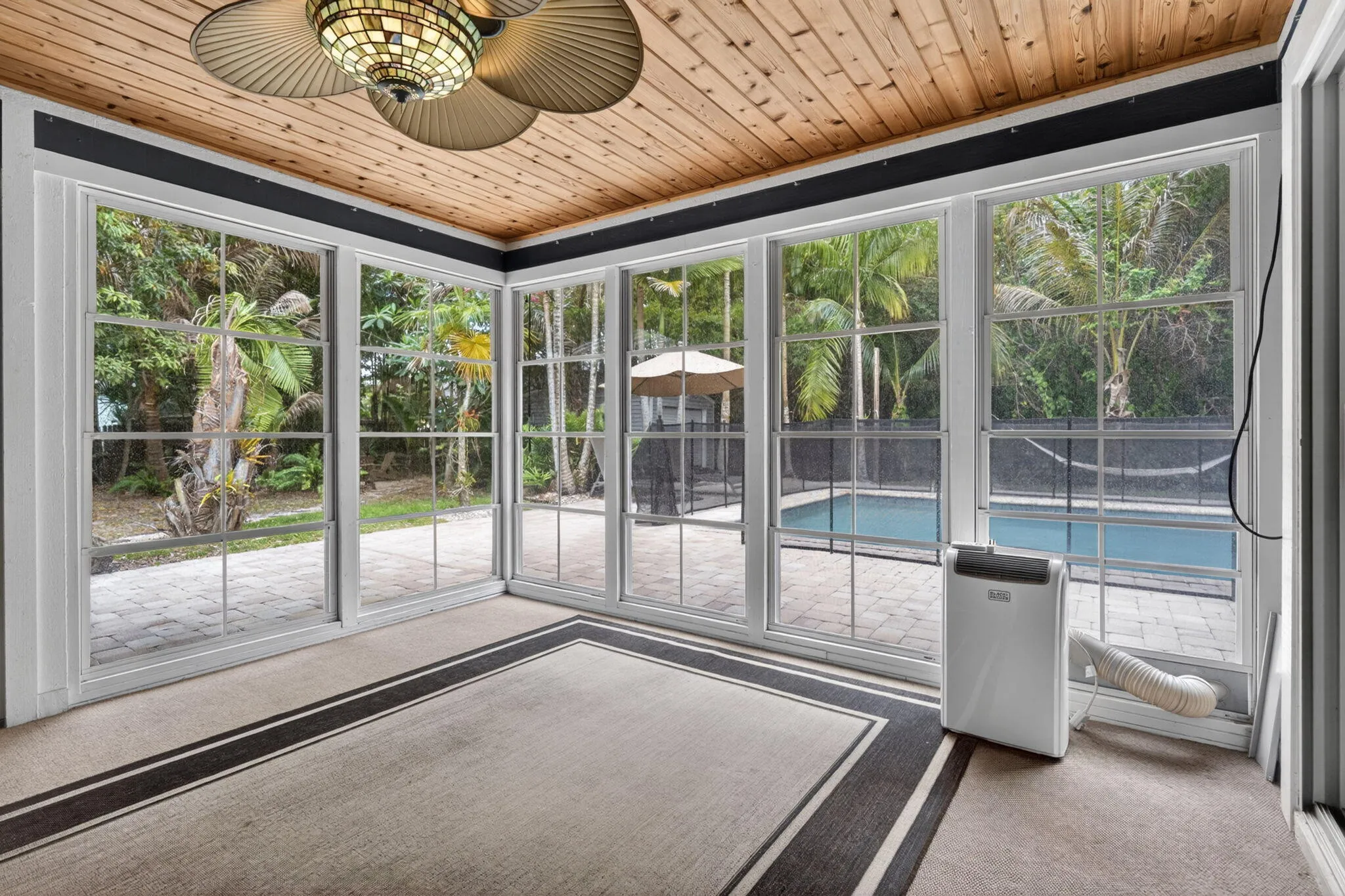 Closed patio with vinyl windows