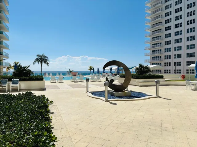 Elegant pool deck leading to Ocean access
