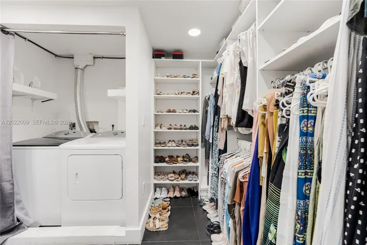 Main Closet with Washer and Drier