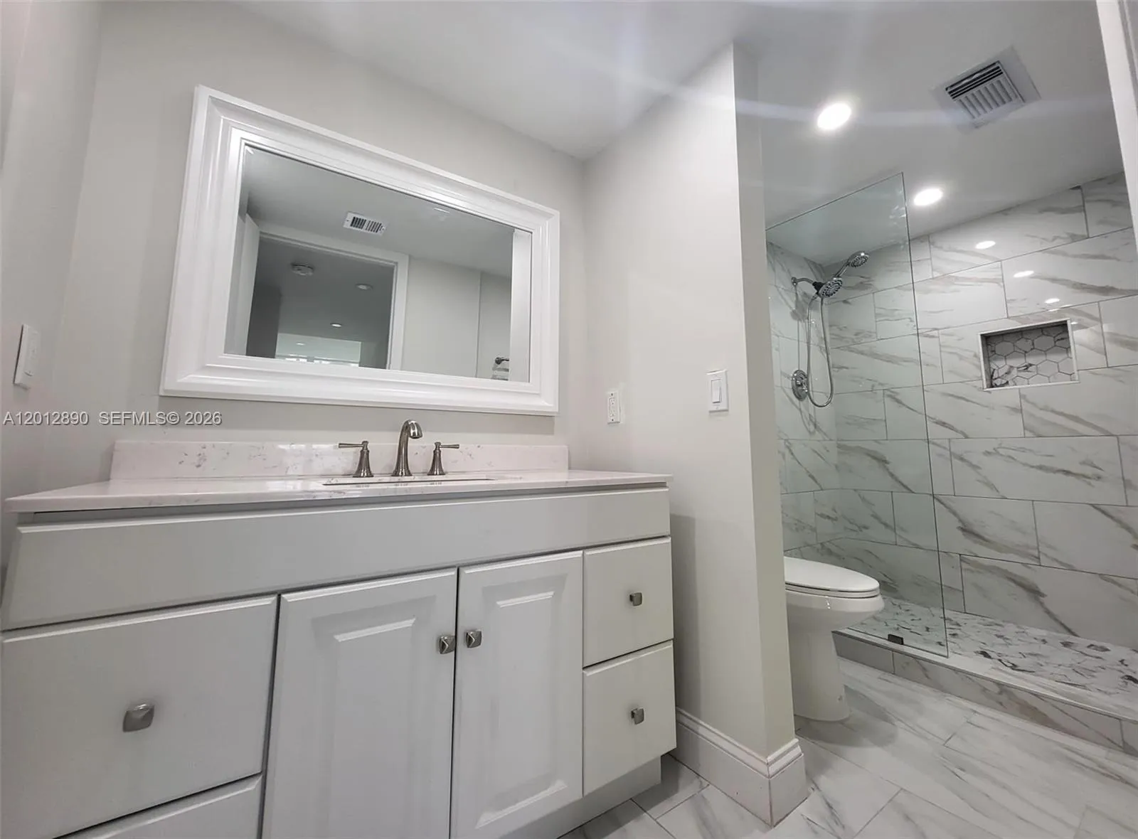 Beautifully expanded and renovated master bathroom