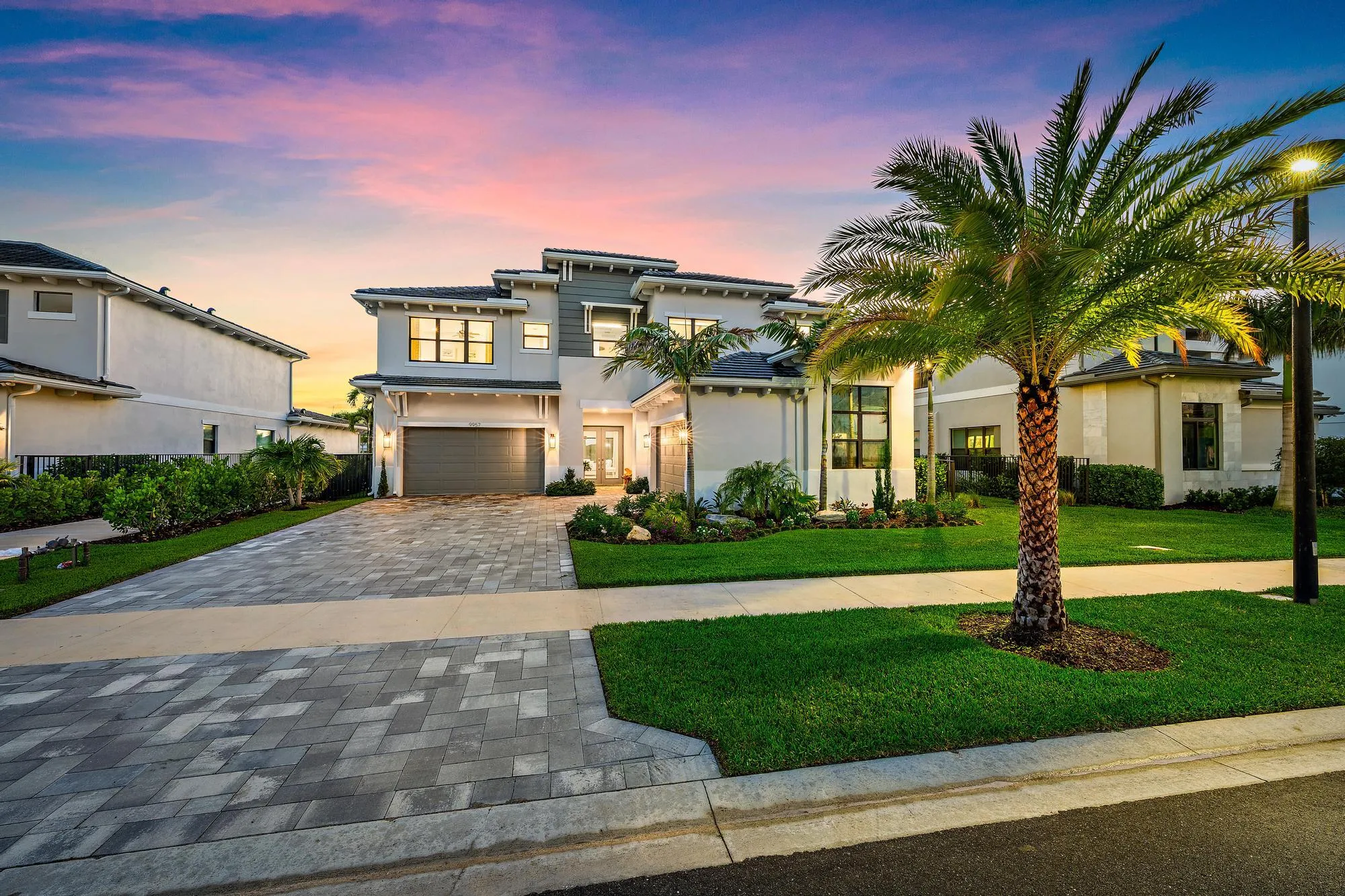 Upgraded driveway pavers and exterior lighting.