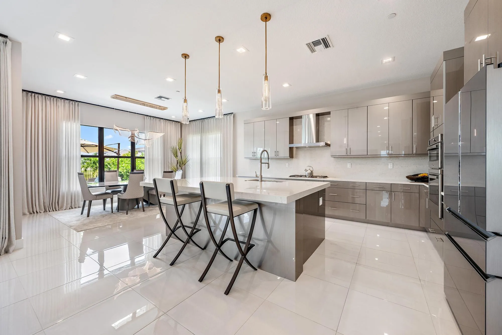 Complete with a gas range, high-end appliances, and upgraded finishes.
