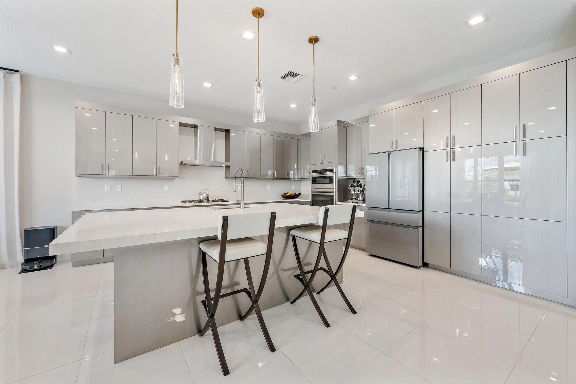 Complete with a gas range, high-end appliances, and upgraded finishes.