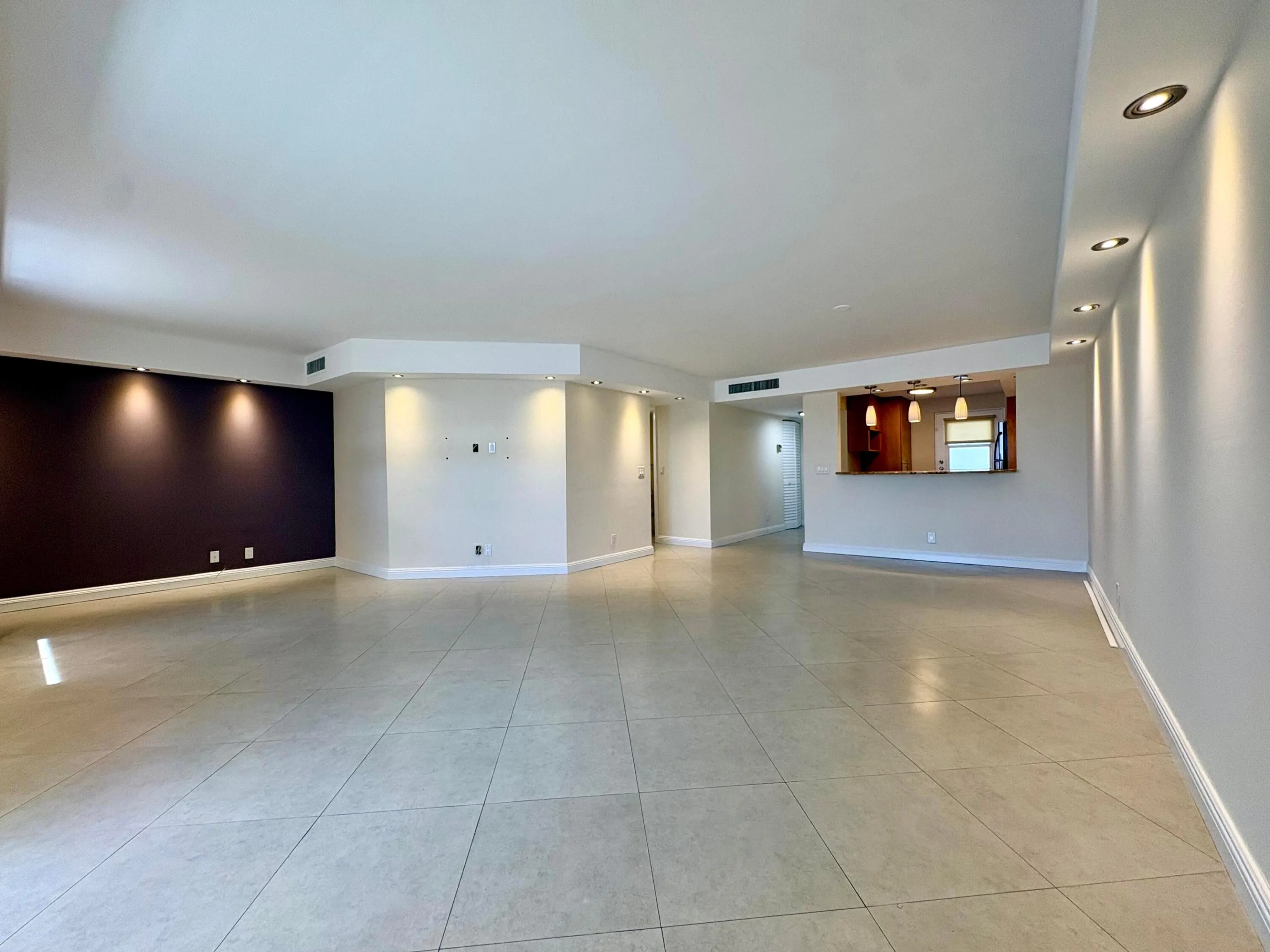 LIVING, DINING AND DEN AREA