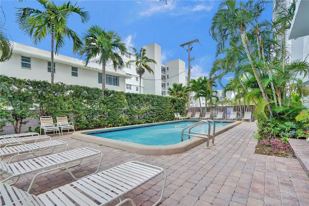 Community Pool in Tropical Setting of Leisure Sands