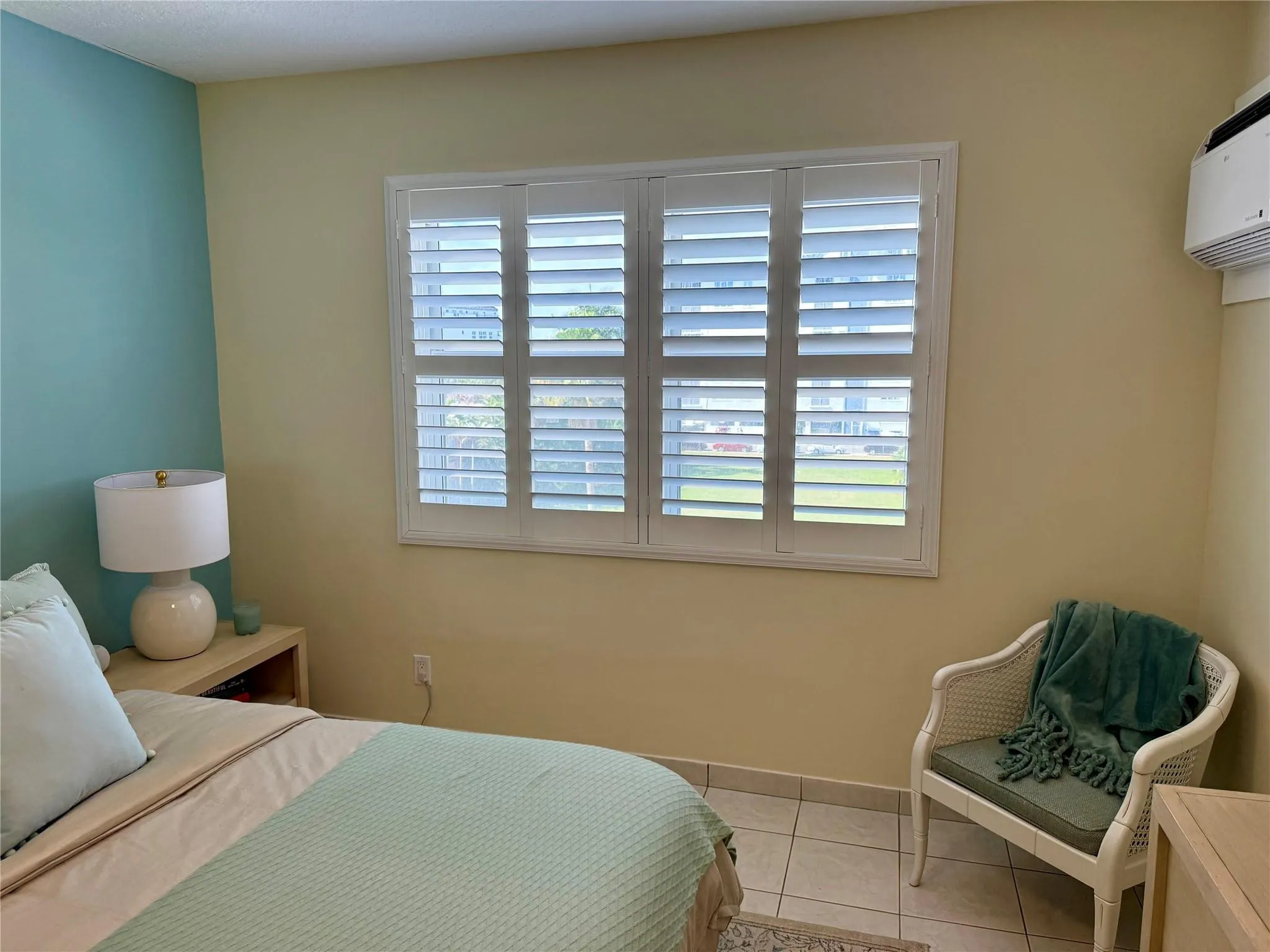 Impact windows and plantation shutters.