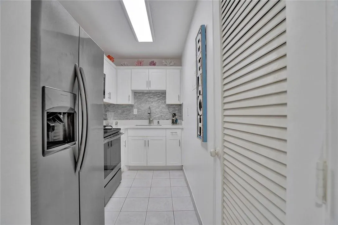 Beautifully Updated kitchen with full size Closet Pantry.