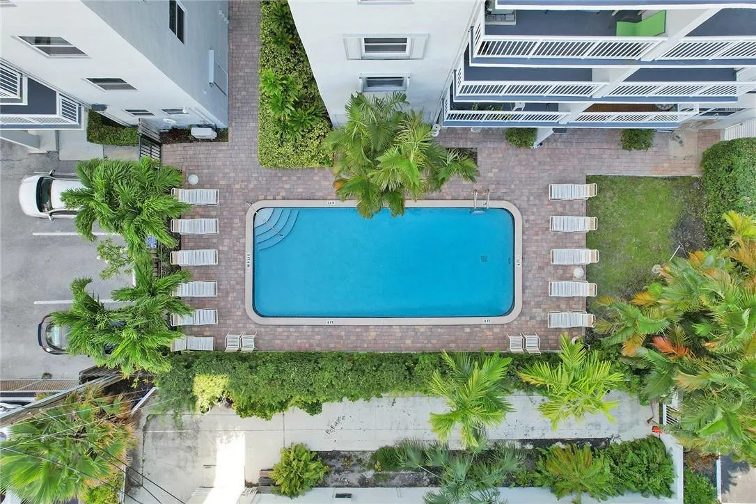Community Pool in Tropical Setting of Leisure Sands