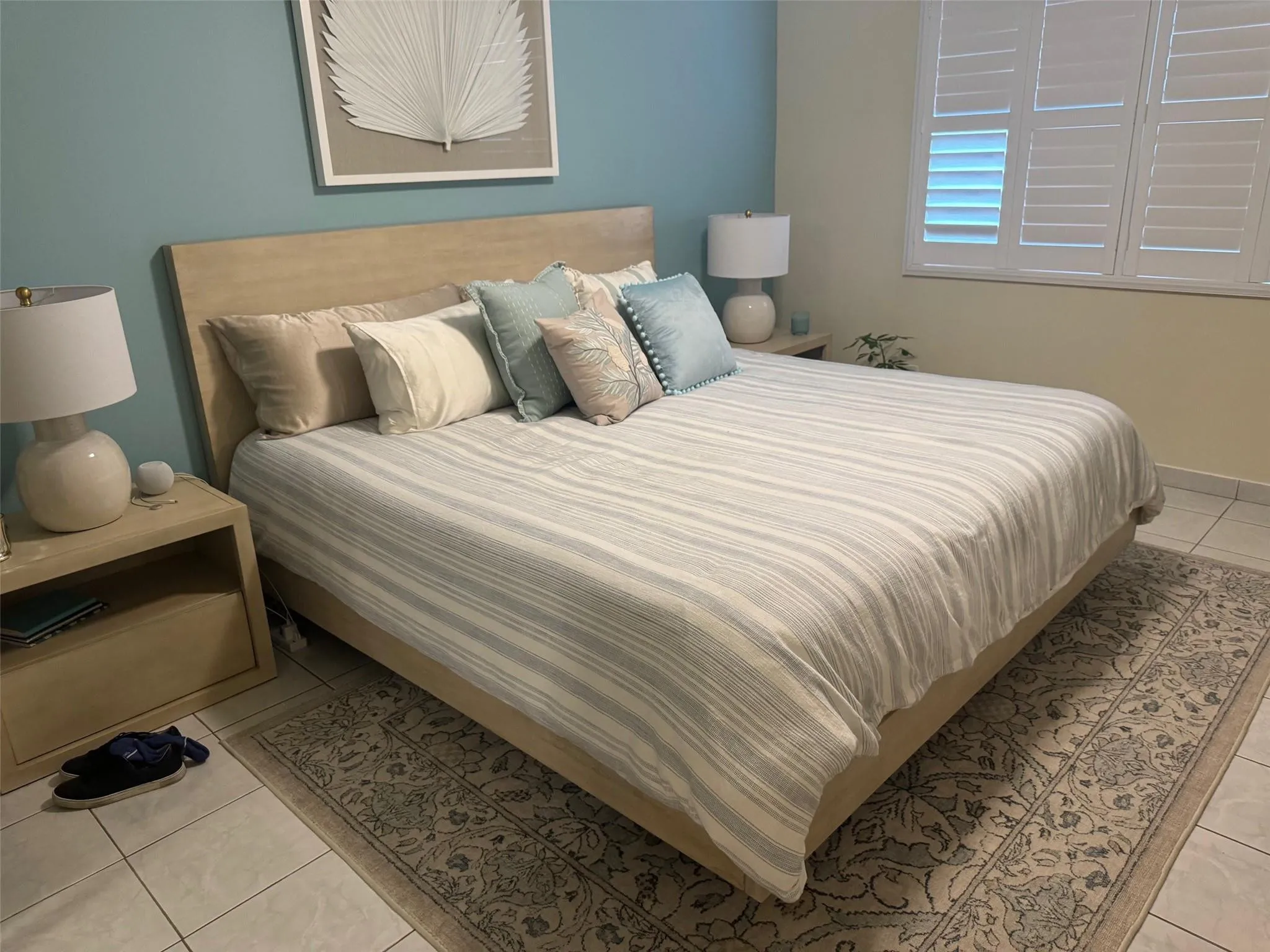The king-size Pottery Barn bed and matching nightstands may remain with the condo rental or can be removed upon request.