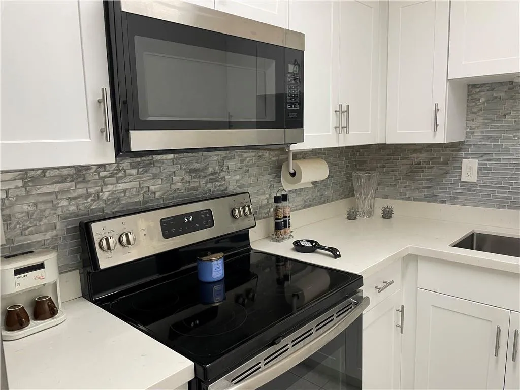 Quartz Countertops and modern backsplash
