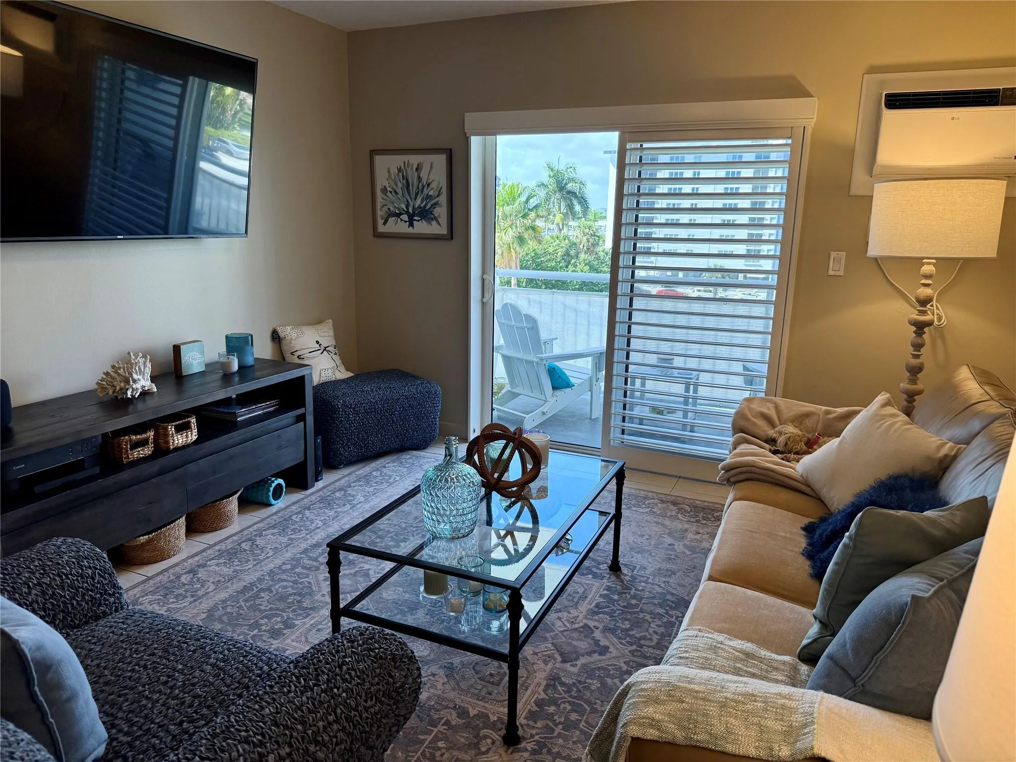 Cozy Living Room with 65 in TV included with this rental. Living Room furniture is not included.