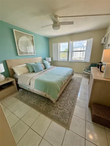 The king-size Pottery Barn bed and matching nightstands may remain with the condo rental or can be removed upon request.