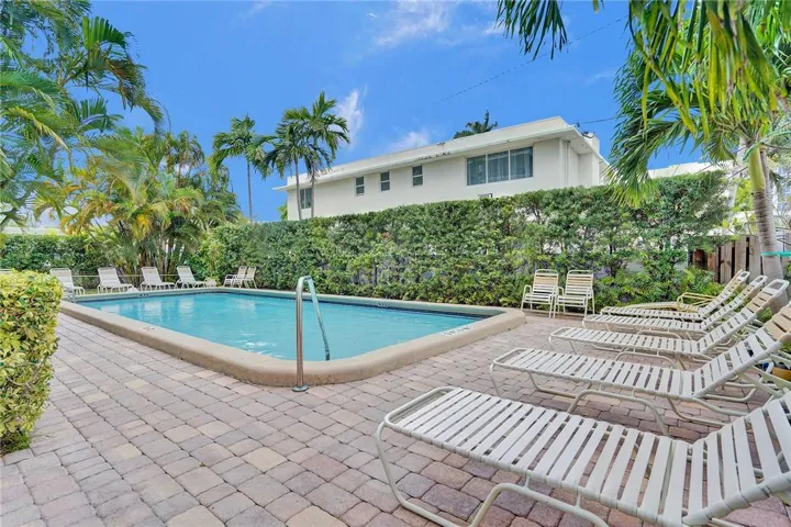 Community Pool in Tropical Setting of Leisure Sands