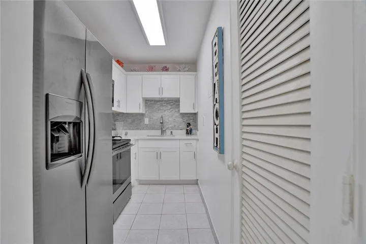 Beautifully Updated kitchen with full size Closet Pantry.