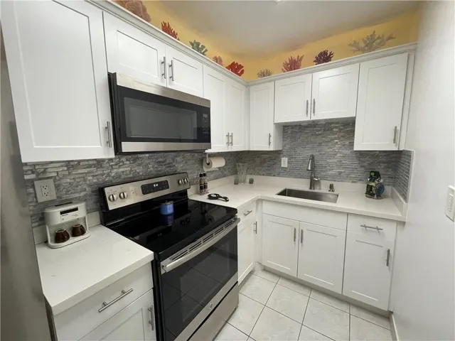 Updated Kitchen with Stainless Appliances.