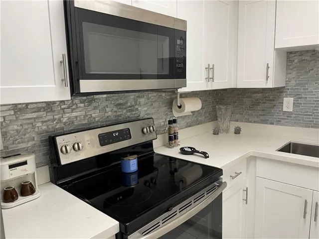 Quartz Countertops and modern backsplash