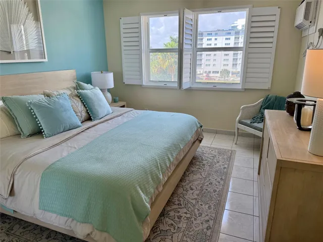 The king-size Pottery Barn bed and matching nightstands may remain with the condo rental or can be removed upon request.
