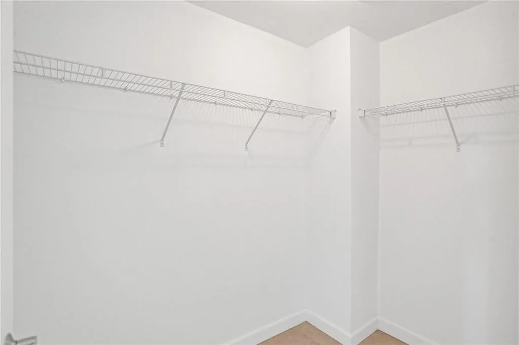 PRIMARY WALK-IN CLOSET