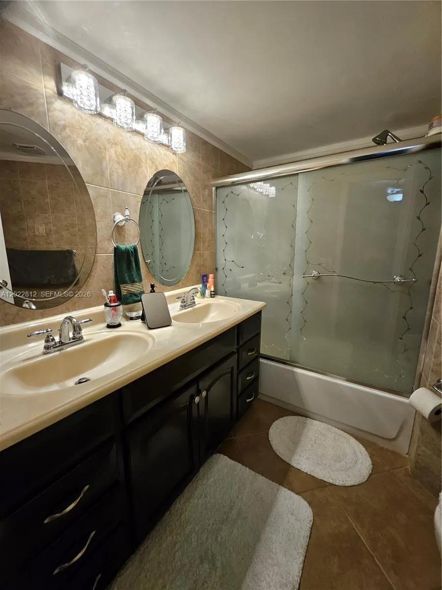 Updated Master Bathroom with double His & Her's sinks