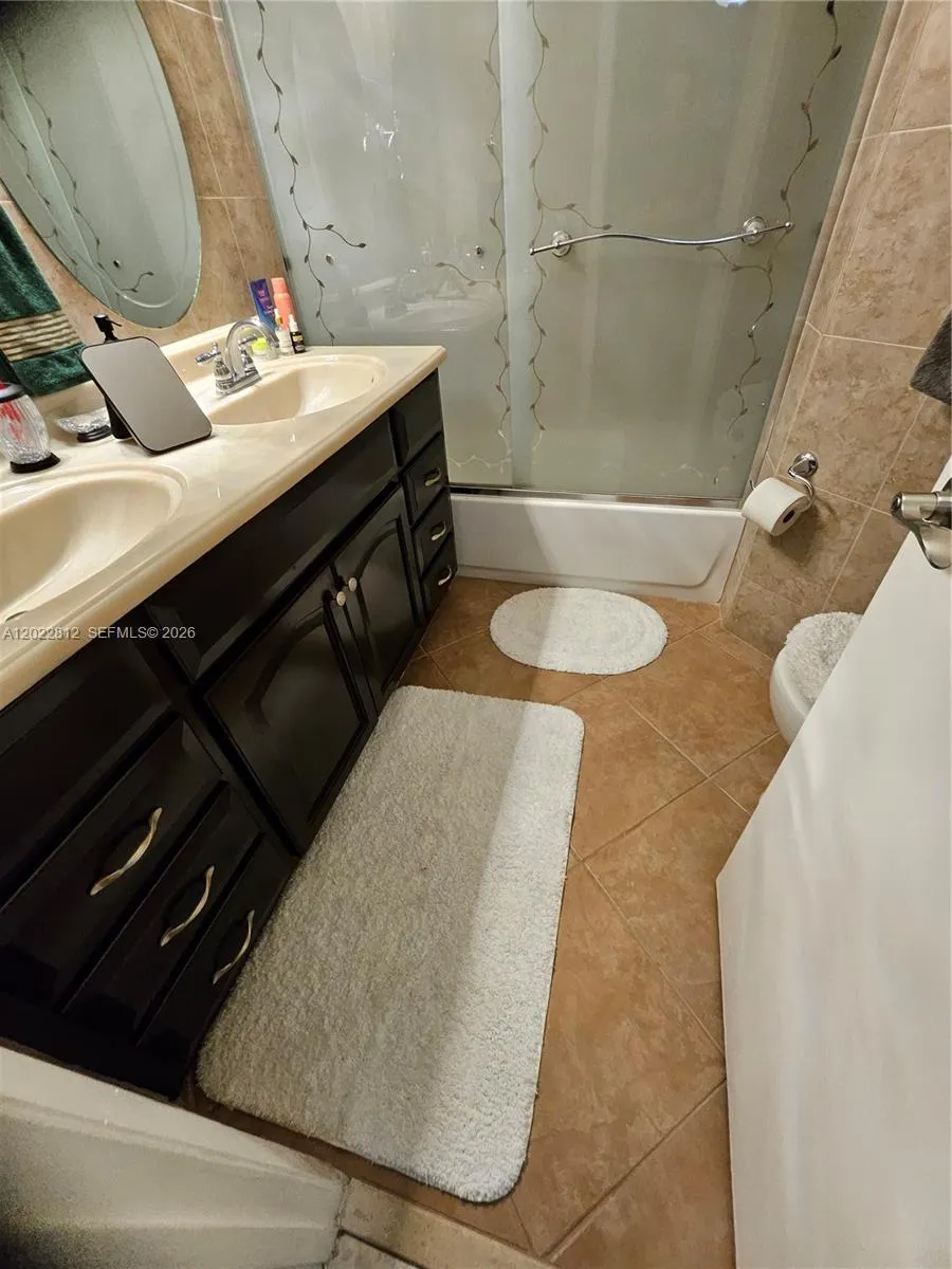 Updated Master Bathroom with double His & Her's sinks