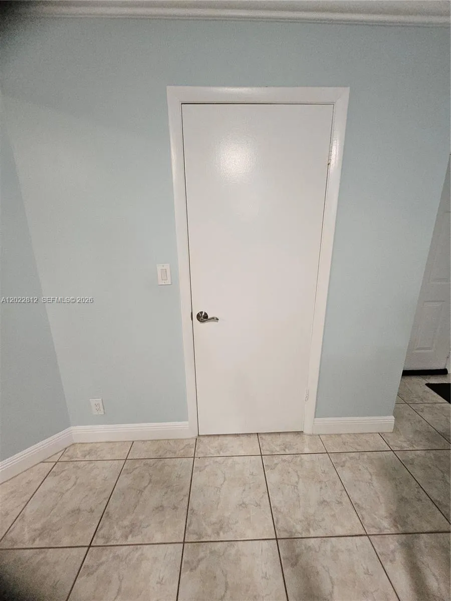 Door to Huge walk-in Pantry Closet