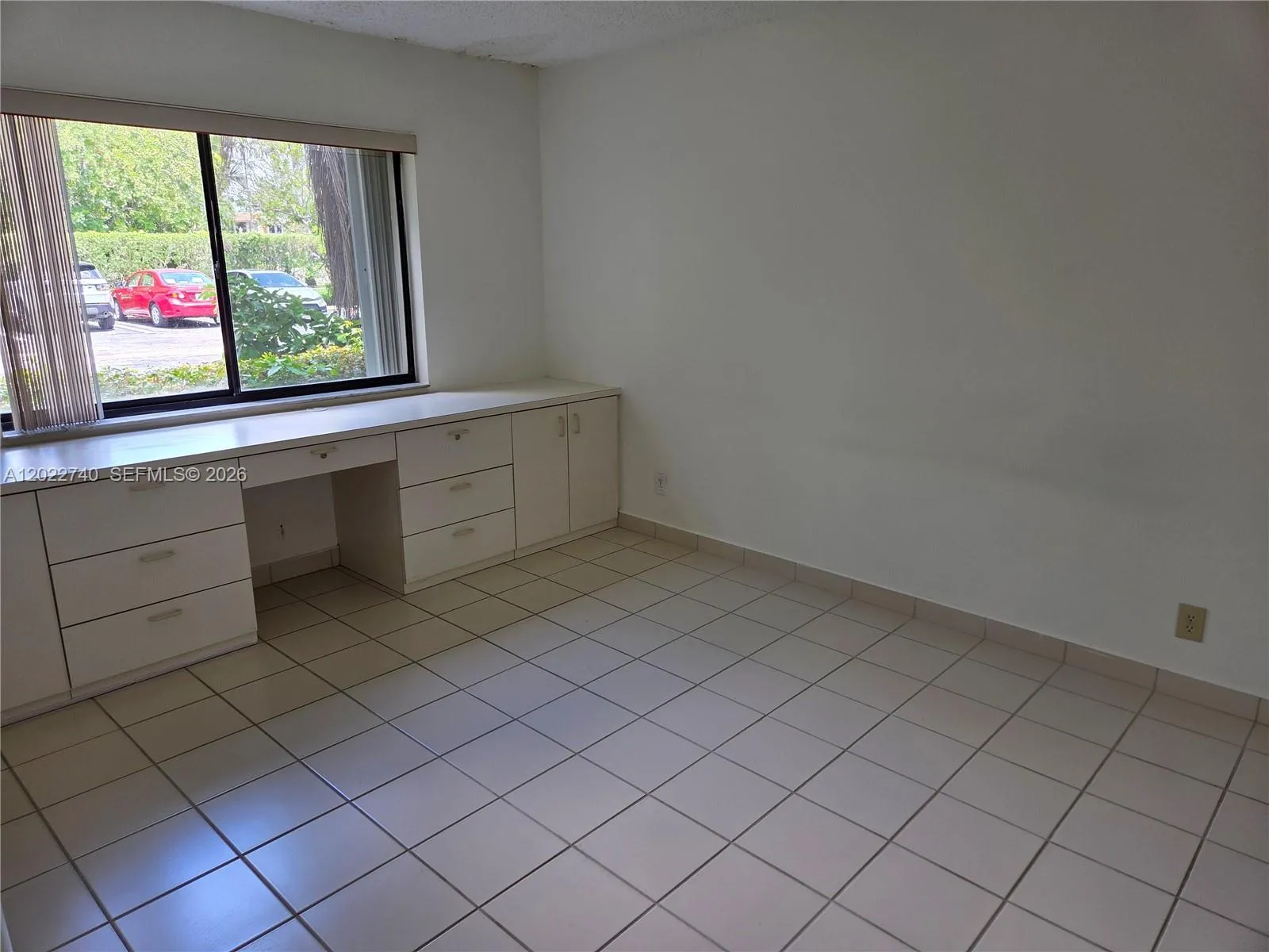 Bedroom 2 with a built in Desk.