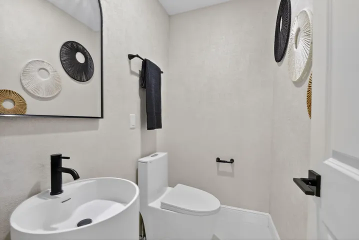 Ground floor half bath off the kitchen