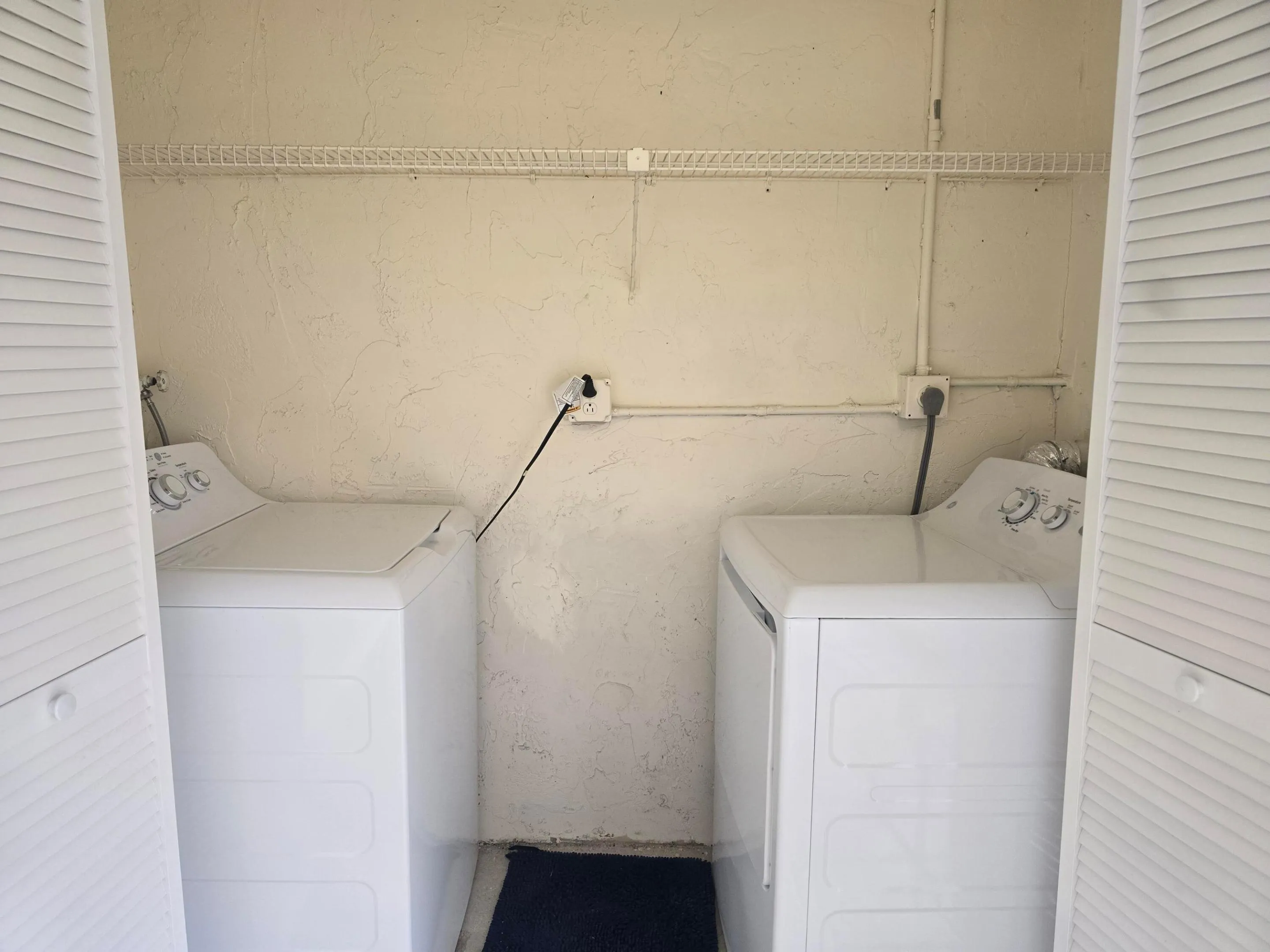 PATIO HAS TWO CLOSETS, ONE FOR LAUNDRY & 2ND FOR STORAGE