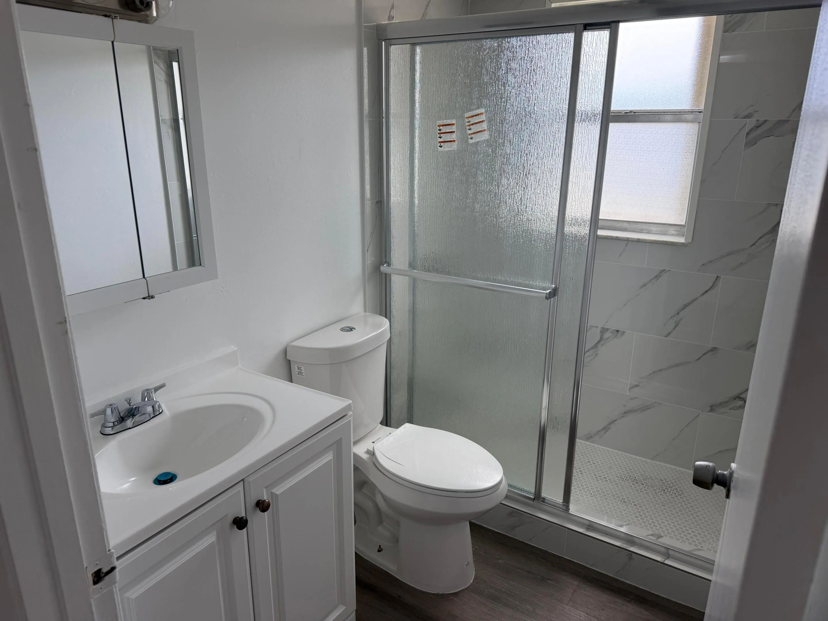 New bathroom cabinet, toilet and shower