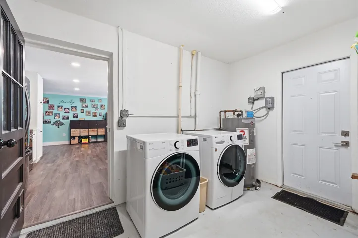 Utility room with full size washer and dryer